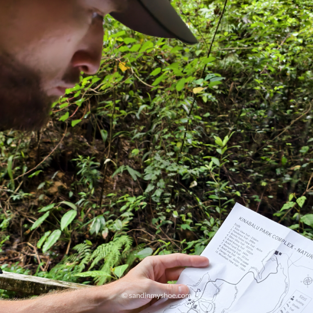 Petteri studying the map of Park Kinabalu.