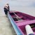 Boat stuck in shallow low tide outside a Sea Gypsy Malaysia village