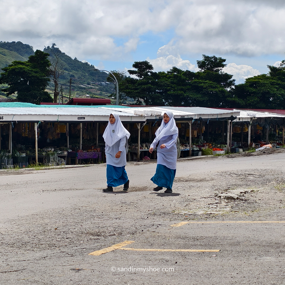 Two girls at the bus station in Kundasang