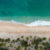 Drone shot of the beach in Tangalle during April, showing the warm pre‑monsoon conditions travellers consider when asking if April is a good month to visit Sri Lanka.
