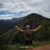 Petteri standing on a mountain viewpoint in Ella during May, showing the mixed Hill Country conditions travellers consider when asking if May is a good month to visit Sri Lanka.