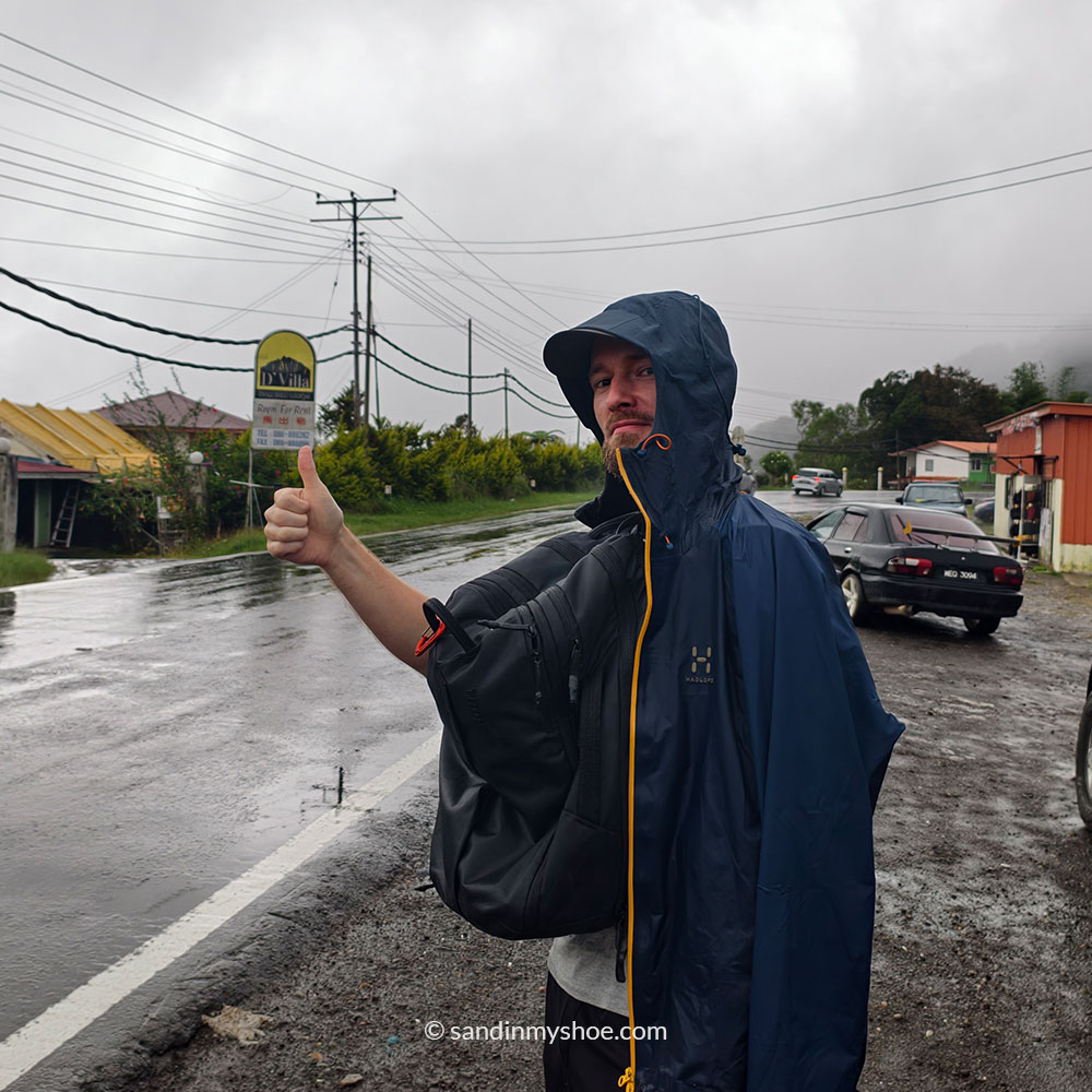 Petteri hitchhiking in Kundsang, Borneo